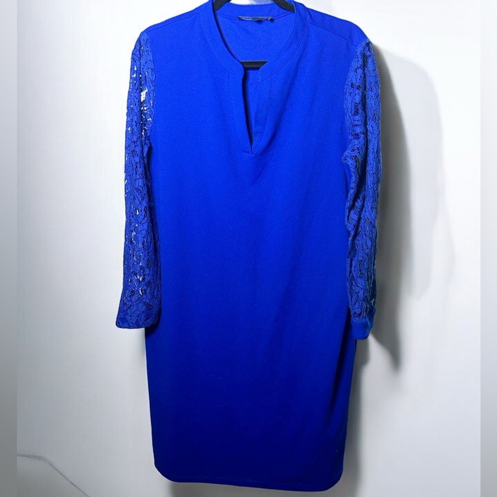 Elegant royal blue dress with lace sleeves and a V-neck. Wedding perfect!